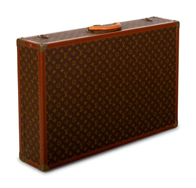 Lot - A Louis Vuitton monogram Alzer 75 hard sided suitcase 1980s