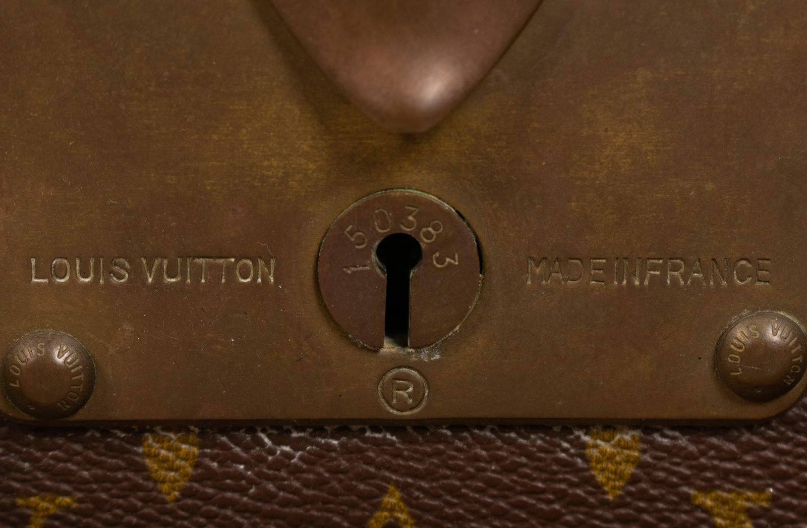 Lot - A Louis Vuitton monogram Alzer 75 hard sided suitcase 1980s