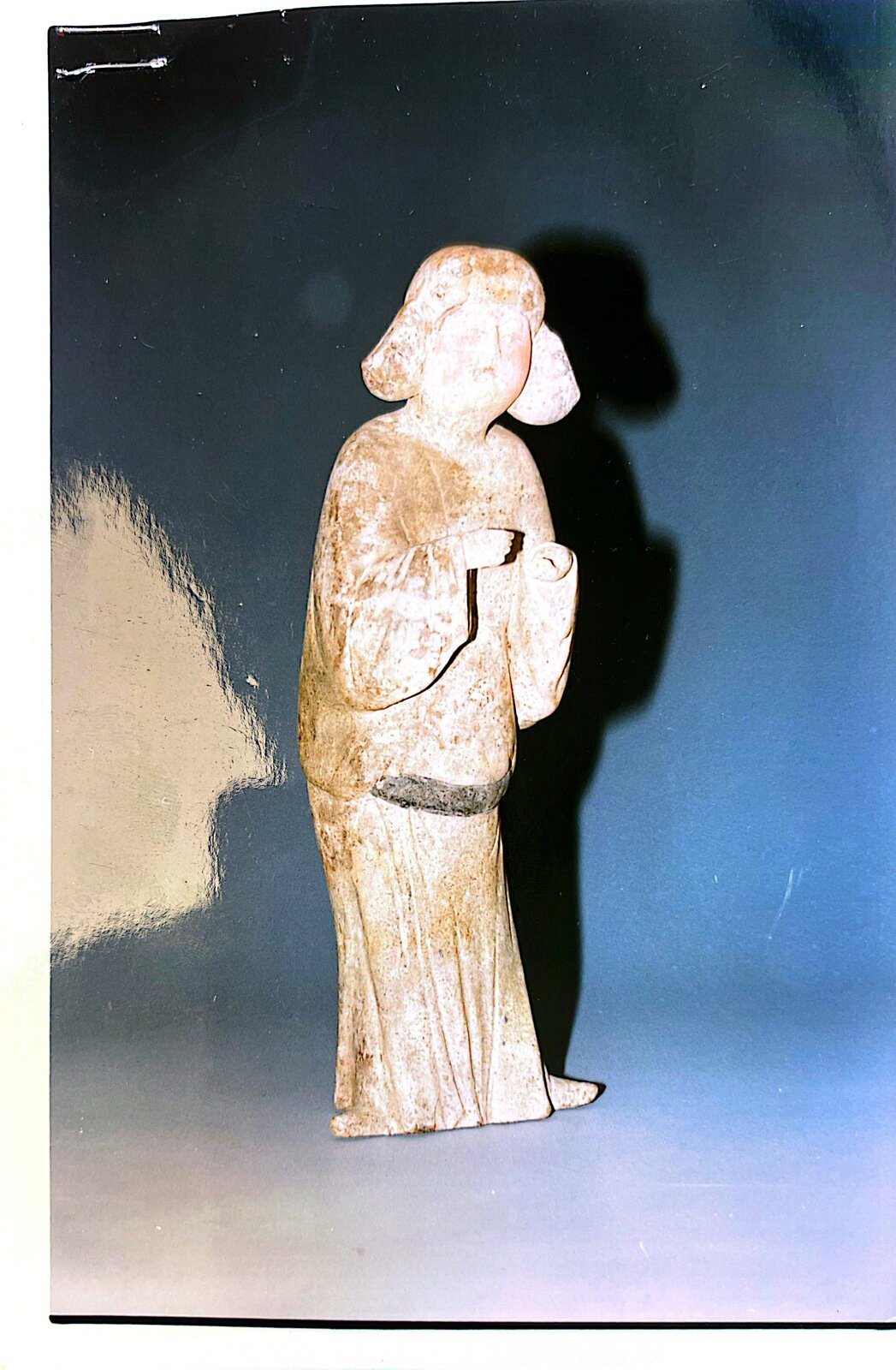 A Chinese Painted Pottery Figure of a Court Lady