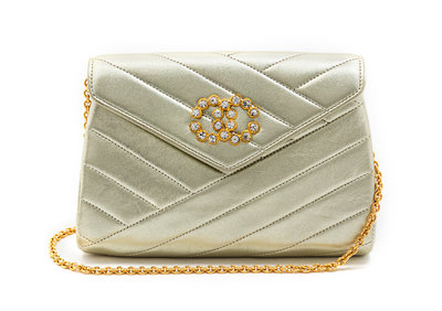 Sold at Auction: CHANEL GOLD QUILTED LEATHER CONVERTIBLE CLUTCH BAG