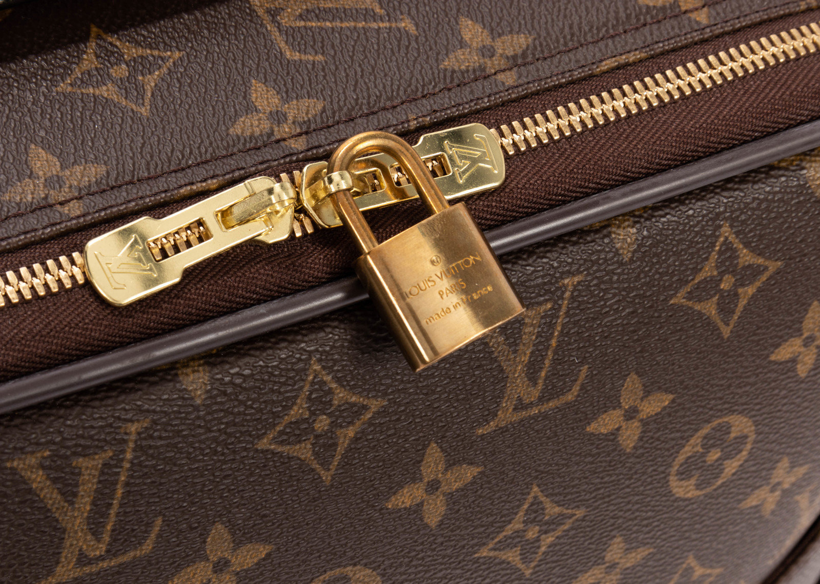 At Auction: A Louis Vuitton Monogram Pegase Suitcase.