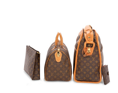 Sold at Auction: Licensed 1970s Louis Vuitton Logo Roll Bag
