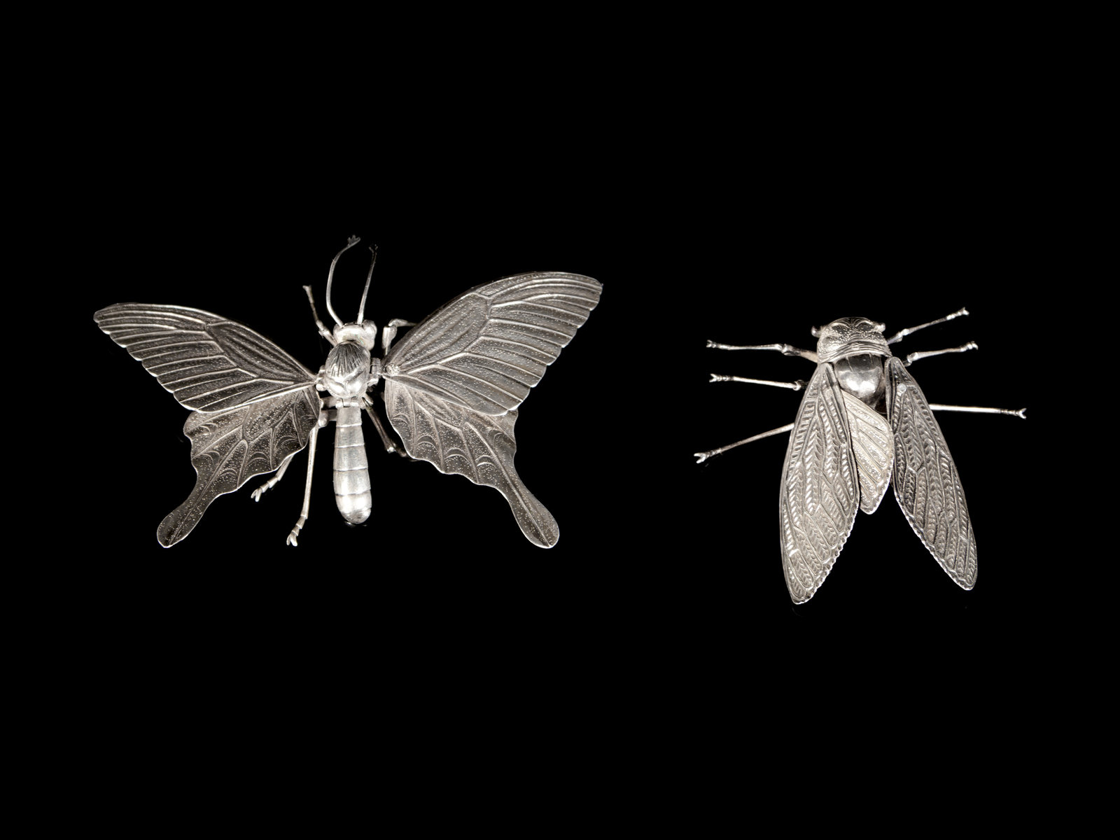 Two Silver Articulated Models of Insects